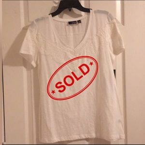 White top with neckline detail